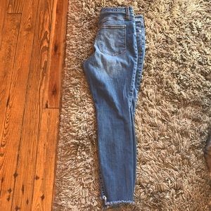 High rise, skinny frayed jeans.